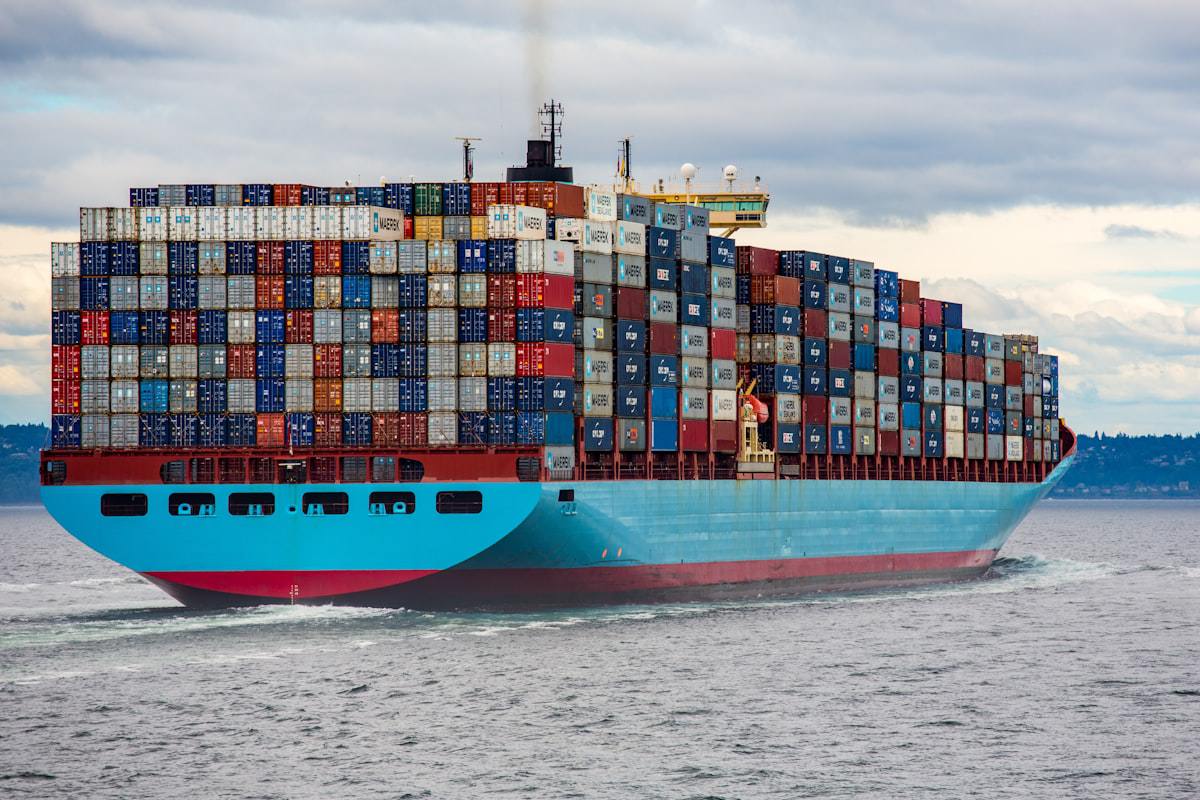 Container ship under way at sea, repositioning equipment across trade lanes