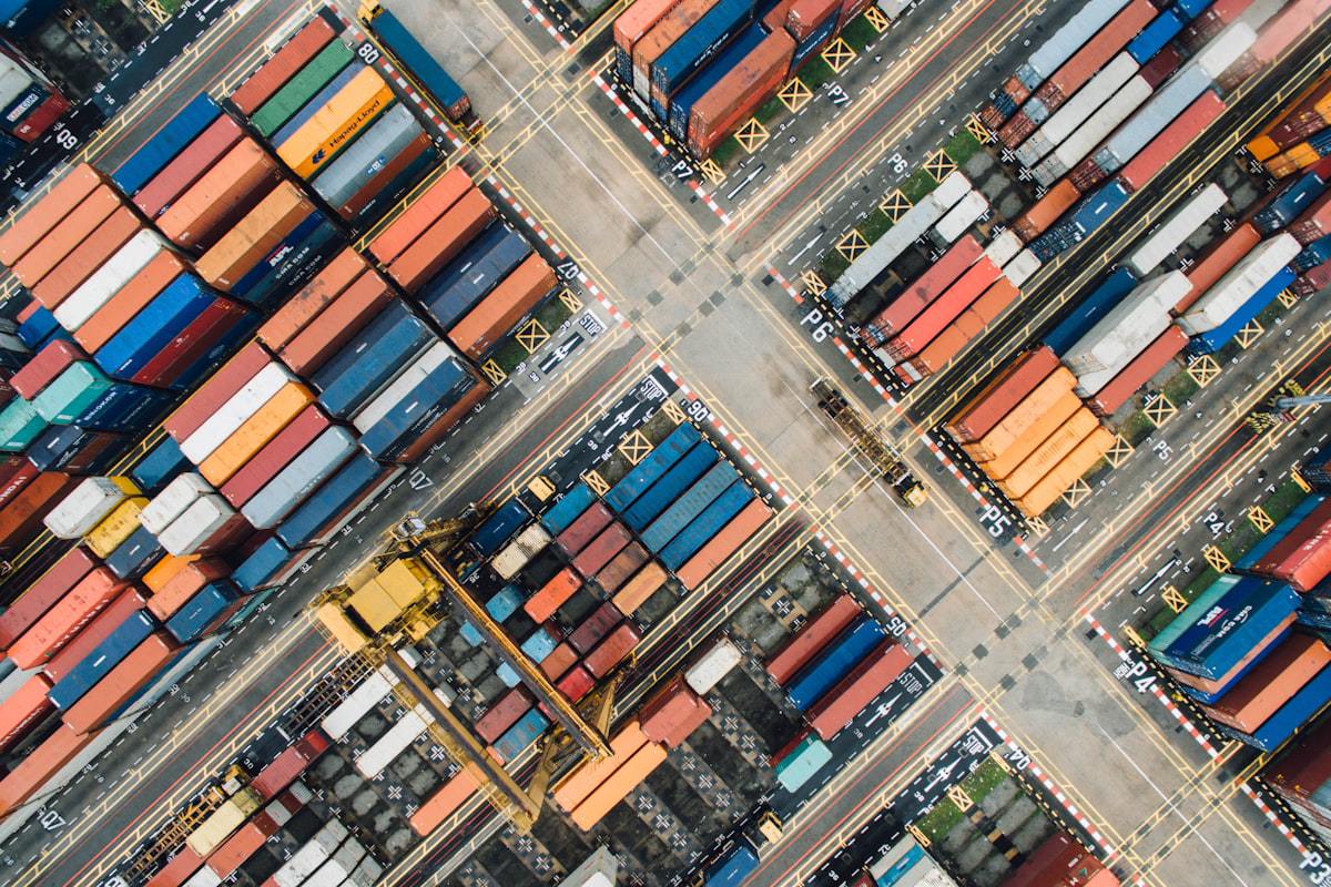 Rows of stacked shipping containers at a terminal